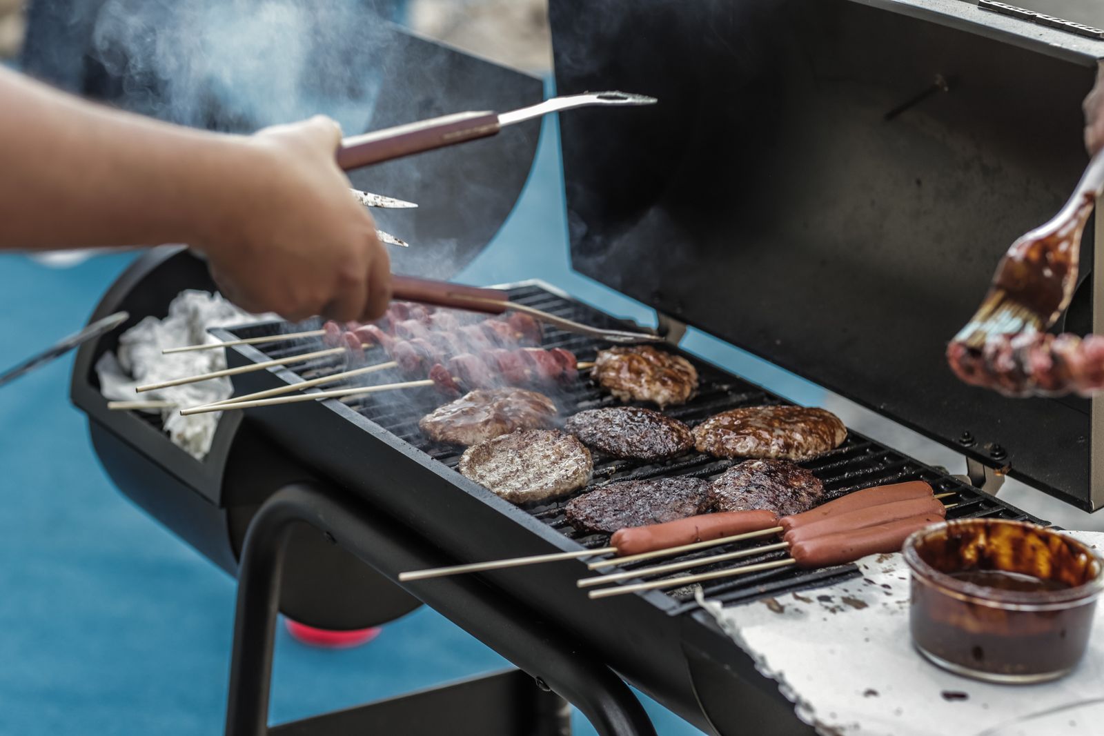 Smoke rising off a loaded barbecue