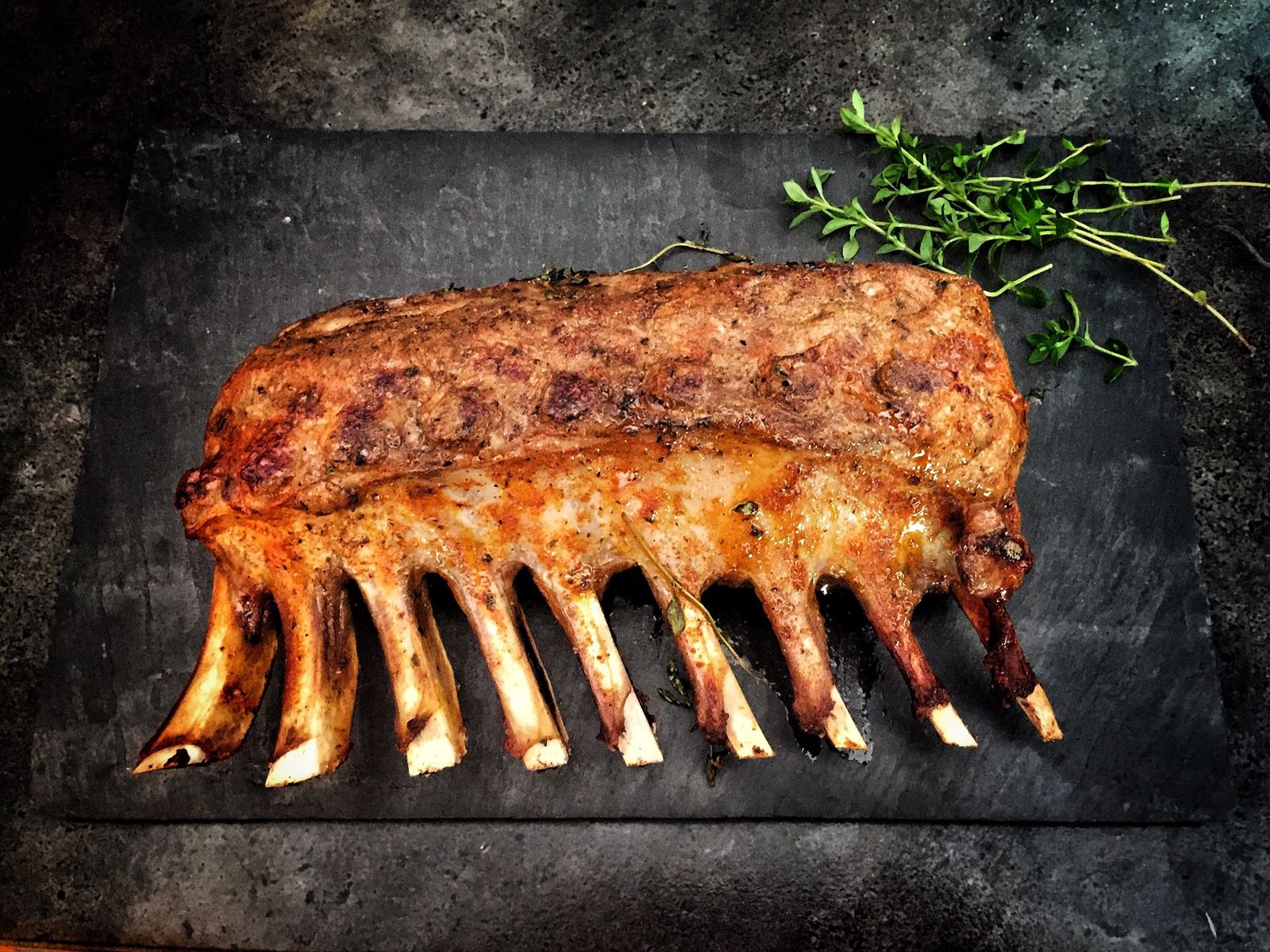 Frenched rack roast on slate